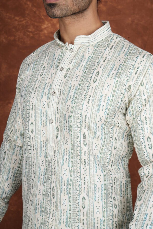 Men wearing vrindavan jacquard kurta in soft green with mandarin collar for wedding and festive wear