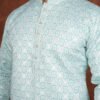 Men wearing ayaan geometric jacquard kurta in mint green with mandarin collar for wedding and festive wear