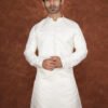Men wearing ivory white heritage jacquard kurta with mandarin collar for wedding and festive wear