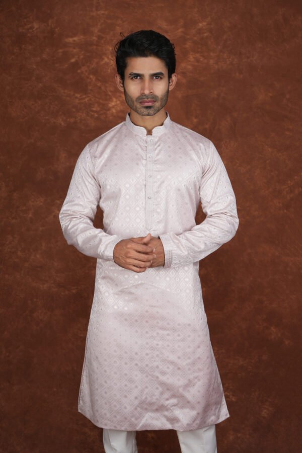 Men wearing classic diamond jacquard kurta in soft pink with mandarin collar for wedding and festive wear