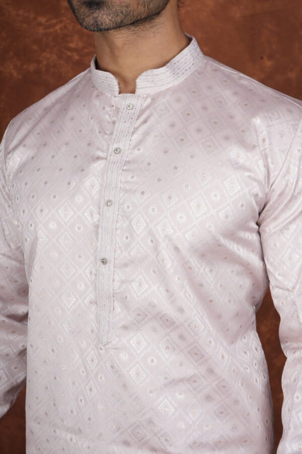 Men wearing classic diamond jacquard kurta in soft pink with mandarin collar for wedding and festive wear
