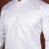 Men wearing white weave jacquard kurta with mandarin collar for wedding and festive wear
