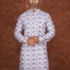 Men wearing gulbahar floral jacquard kurta with yellow and purple floral motifs for wedding and festive wear