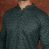 Men wearing royal green textured jacquard kurta with full sleeves and band collar for festive and traditional occasions