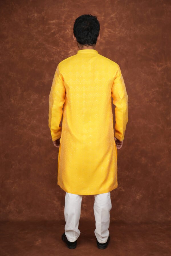 Men wearing suryakant jacquard kurta in vibrant yellow with mandarin collar for wedding and festive wear