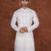 Men wearing light green heritage jacquard kurta with mandarin collar for wedding and festive wear