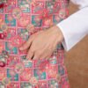 Men wearing pink folk art jacquard Modi jacket set with band collar for festive and wedding occasions