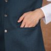 Men wearing dark green Rivayat Heritage jacquard Modi jacket with band collar for festive and wedding occasions